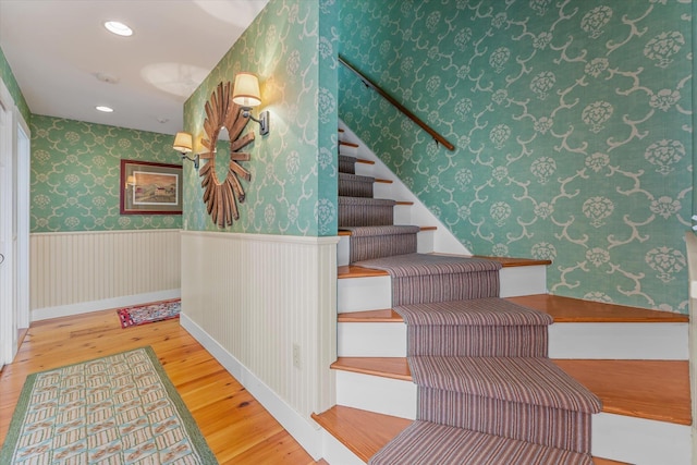444 Tin Shanty Rd, Shrewsbury, VT 05738 - stairway featuring wallpapered walls, a wainscoted wall, recessed lighting, and wood finished floors