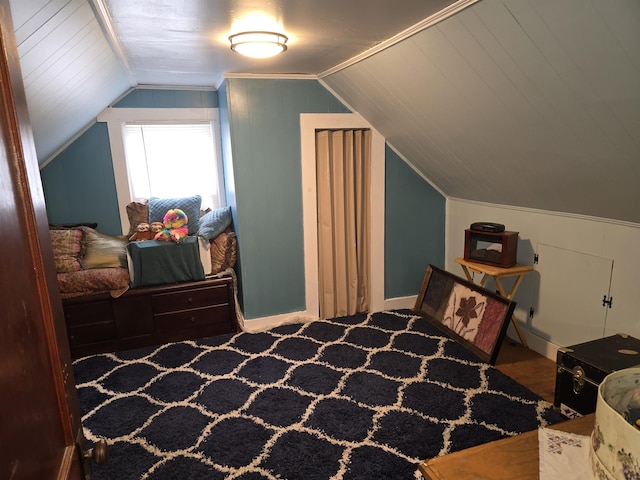 bedroom featuring lofted ceiling