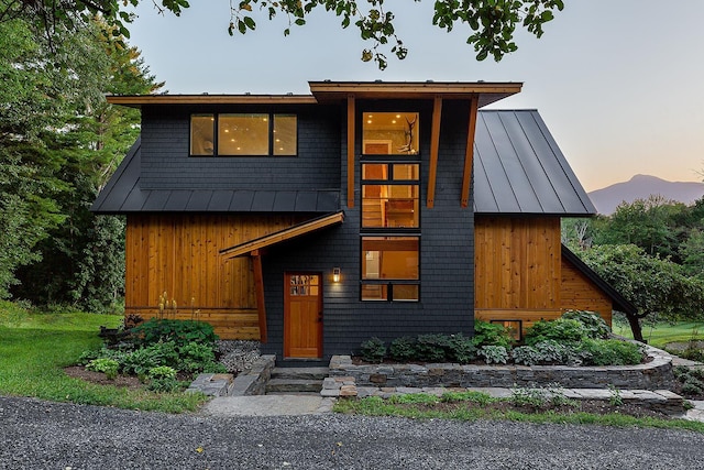 437 Lonesome Trl, Waterbury, VT 05676 - view of front of home with a standing seam roof and metal roof