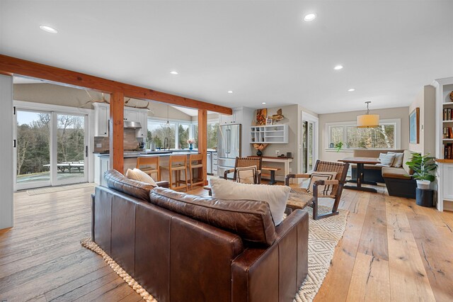 437 Lonesome Trl, Waterbury, VT 05676 - living room featuring recessed lighting, a healthy amount of sunlight, and light wood-style floors