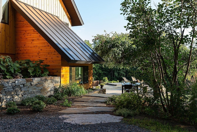437 Lonesome Trl, Waterbury, VT 05676 - view of property exterior featuring board and batten siding, a standing seam roof, and metal roof
