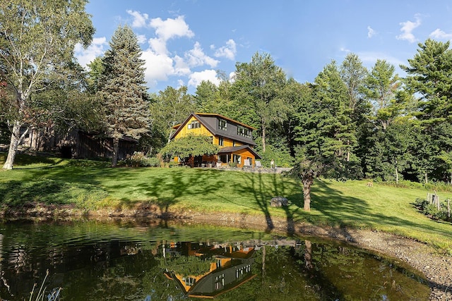 437 Lonesome Trl, Waterbury, VT 05676 - view of yard featuring a water view and a forest view