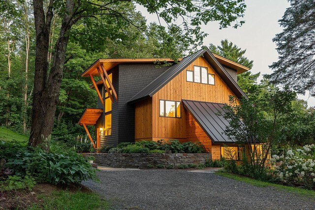 437 Lonesome Trl, Waterbury, VT 05676 - view of front of home with a standing seam roof and metal roof