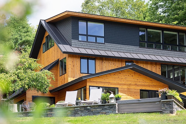 437 Lonesome Trl, Waterbury, VT 05676 - rear view of house with a standing seam roof and metal roof