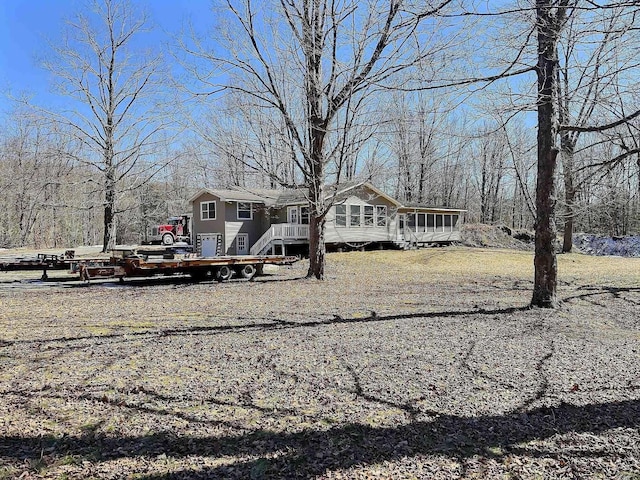 view of front facade featuring a wooden deck