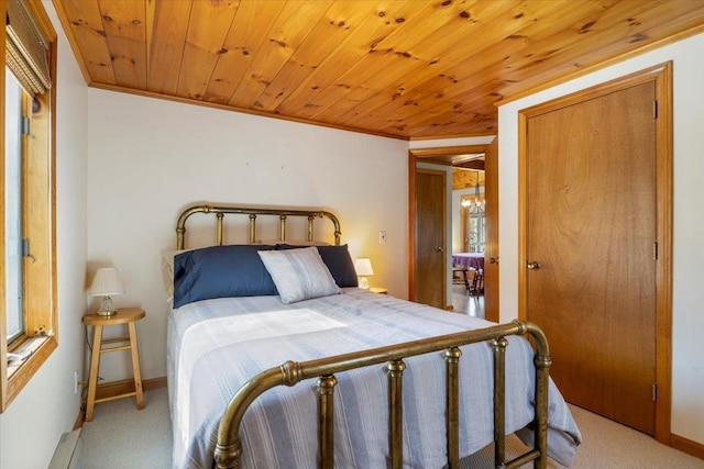 bedroom featuring baseboards, light colored carpet, ornamental molding, and wood ceiling