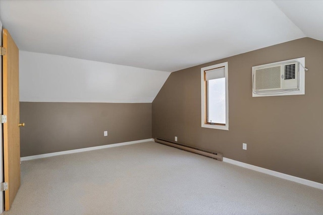 bonus room featuring baseboards, light colored carpet, a baseboard heating unit, and vaulted ceiling
