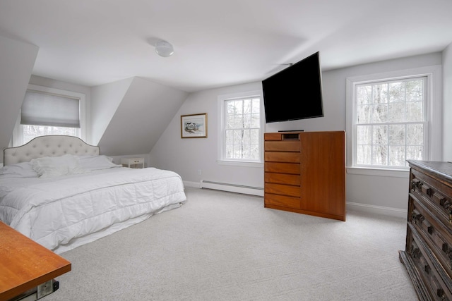 72 Natures Way, Wells, ME 04090 - bedroom featuring a baseboard radiator, light carpet, multiple windows, baseboards, and lofted ceiling