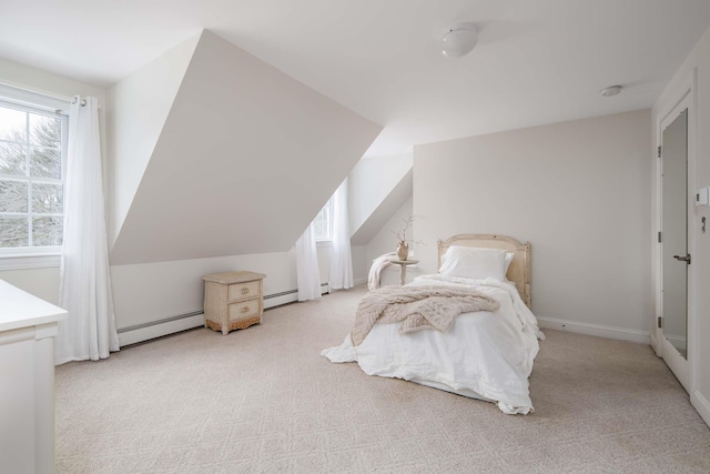 72 Natures Way, Wells, ME 04090 - bedroom with a baseboard heating unit, multiple windows, and carpet floors