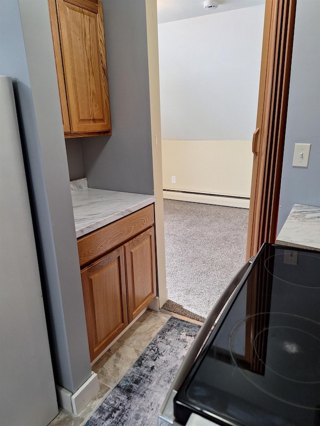 interior space featuring a baseboard heating unit