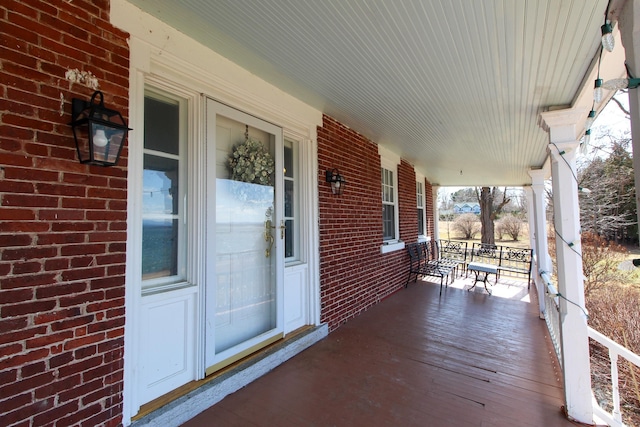14 Adams Landing Rd, Grand Isle, VT 05458 - wooden deck featuring a porch