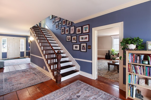 14 Adams Landing Rd, Grand Isle, VT 05458 - staircase featuring baseboards, ornamental molding, and wood-type flooring