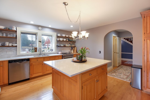 14 Adams Landing Rd, Grand Isle, VT 05458 - kitchen featuring open shelves, light countertops, a sink, and stainless steel appliances