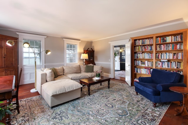 14 Adams Landing Rd, Grand Isle, VT 05458 - living room with a wainscoted wall, ornamental molding, and wood finished floors
