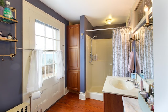 14 Adams Landing Rd, Grand Isle, VT 05458 - bathroom with a stall shower, wood finished floors, and vanity