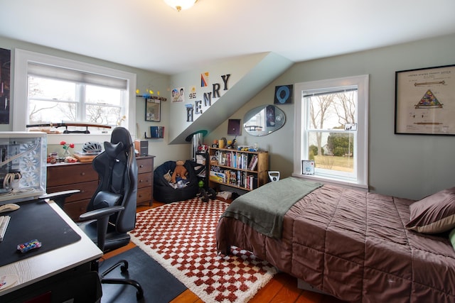 14 Adams Landing Rd, Grand Isle, VT 05458 - bedroom with multiple windows and wood finished floors