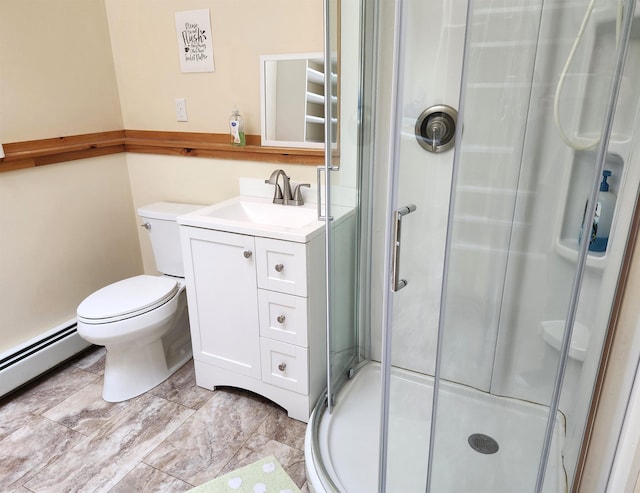full bathroom featuring a stall shower, toilet, a baseboard heating unit, and vanity