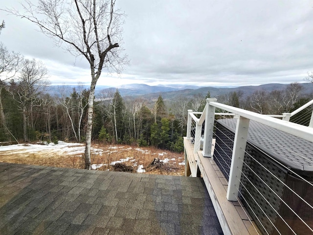 mountain view featuring a view of trees