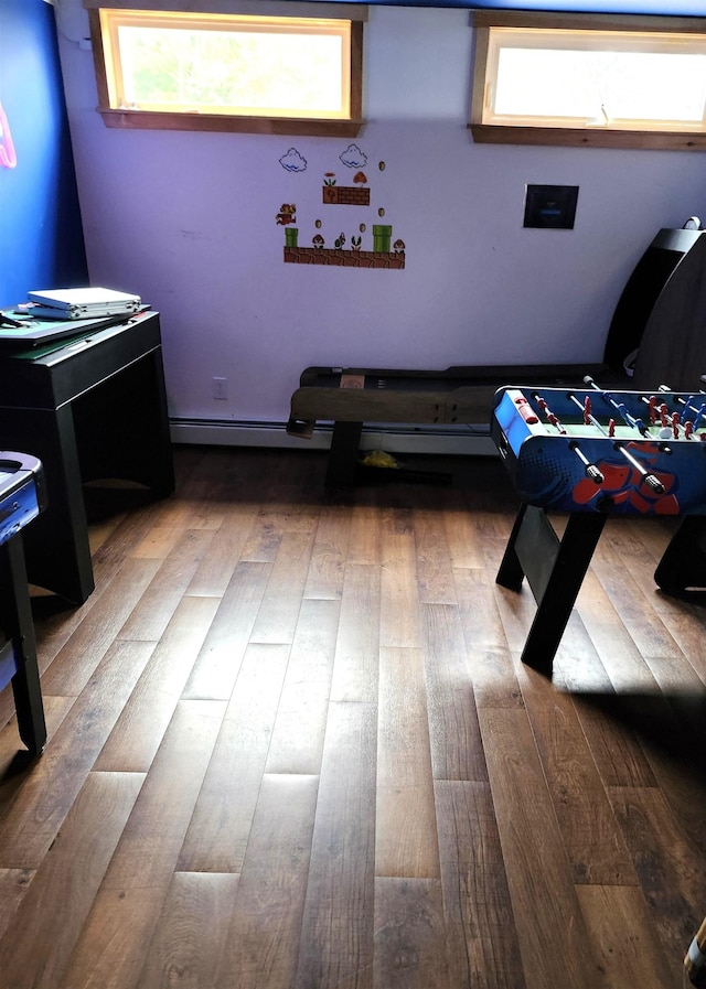 recreation room featuring hardwood / wood-style flooring