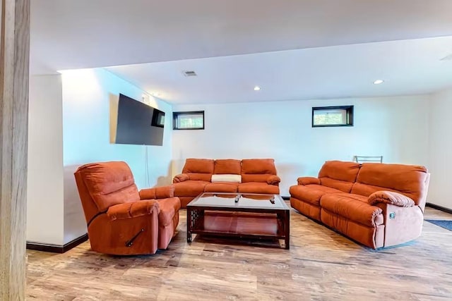 18 Crow Ln, Conway, NH 03818 - living room with plenty of natural light, wood finished floors, baseboards, and recessed lighting