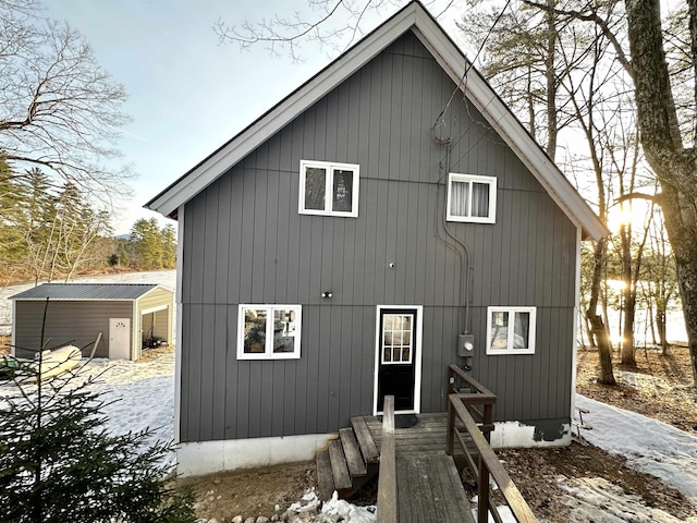 18 Crow Ln, Conway, NH 03818 - view of snow covered back of property