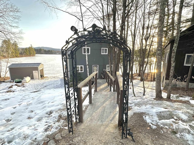 18 Crow Ln, Conway, NH 03818 - snow covered structure featuring a shed and a water view