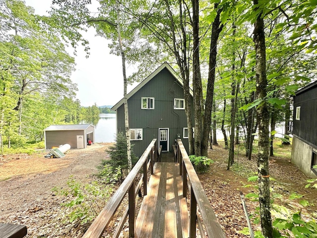 18 Crow Ln, Conway, NH 03818 - rear view of house with a water view