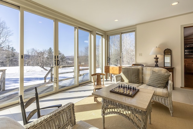 sunroom / solarium with recessed lighting, french doors, tile patterned flooring, and a healthy amount of sunlight