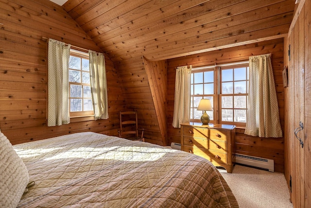 unfurnished bedroom with carpet, vaulted ceiling, wood walls, a baseboard heating unit, and a baseboard radiator