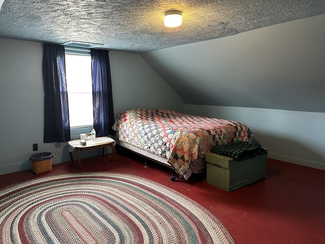 107 Ainsworth Rd, Woodbury, VT 05681 - carpeted bedroom with vaulted ceiling, a textured ceiling, and baseboards