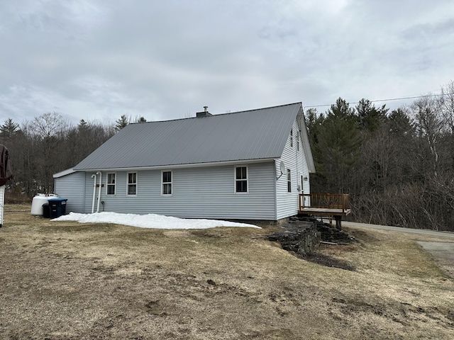 107 Ainsworth Rd, Woodbury, VT 05681 - view of side of home featuring metal roof and a deck