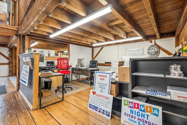 below grade area featuring hardwood / wood-style floors