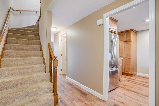 114 Winterwood Dr Unit 114, Londonderry, NH 03053 - stairs featuring baseboards and wood finished floors