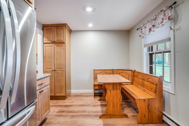 114 Winterwood Dr Unit 114, Londonderry, NH 03053 - dining space with recessed lighting, light wood-style flooring, a baseboard radiator, and baseboards