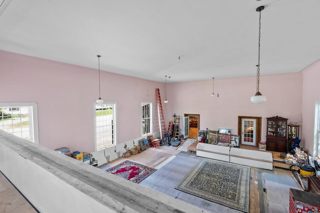 living room featuring high vaulted ceiling