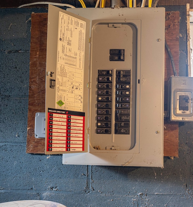 utility room featuring electric panel