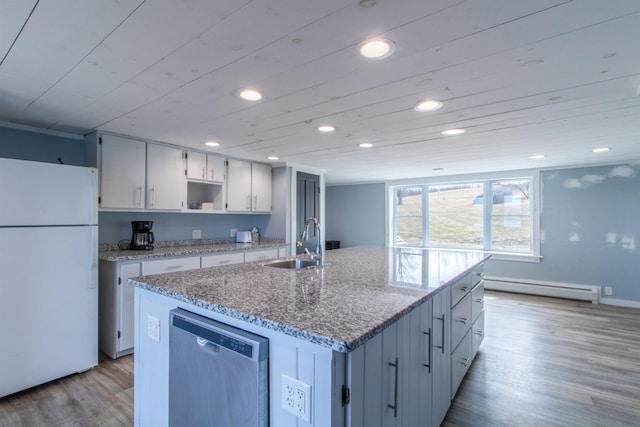 849 Mount Bess Rd, Charleston, VT 05872 - kitchen with a sink, freestanding refrigerator, wood finished floors, stainless steel dishwasher, and a baseboard heating unit