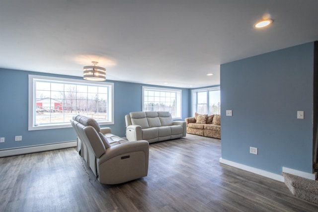 849 Mount Bess Rd, Charleston, VT 05872 - living room featuring a baseboard heating unit, baseboards, recessed lighting, and dark wood-style flooring