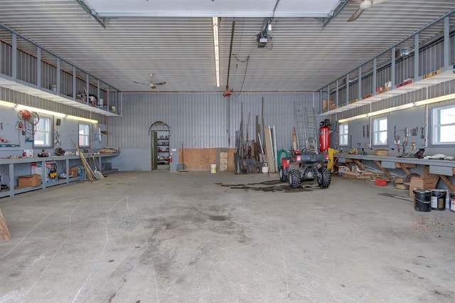 849 Mount Bess Rd, Charleston, VT 05872 - garage featuring a workshop area and metal wall