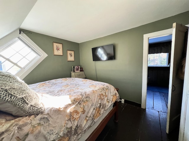 bedroom featuring baseboards