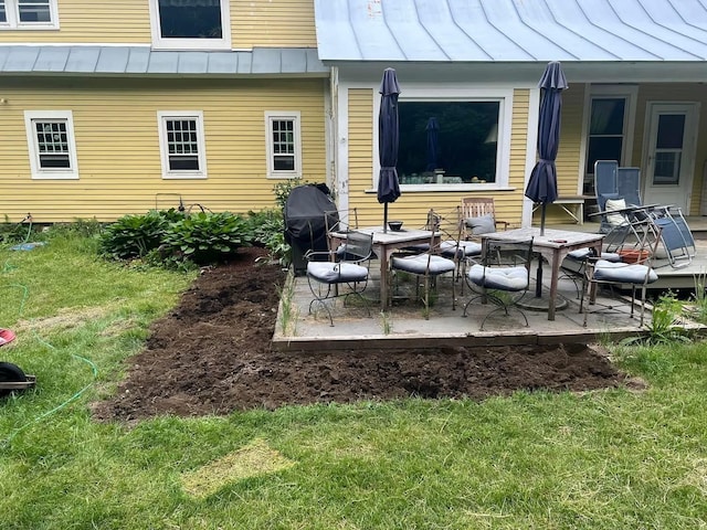 view of patio featuring a grill