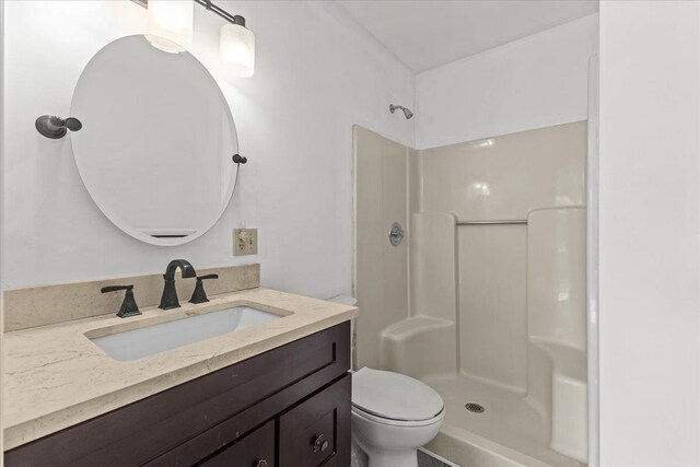 1 Pine Grove Ter, Winooski, VT 05404 - full bathroom with vanity, walk in shower, and toilet