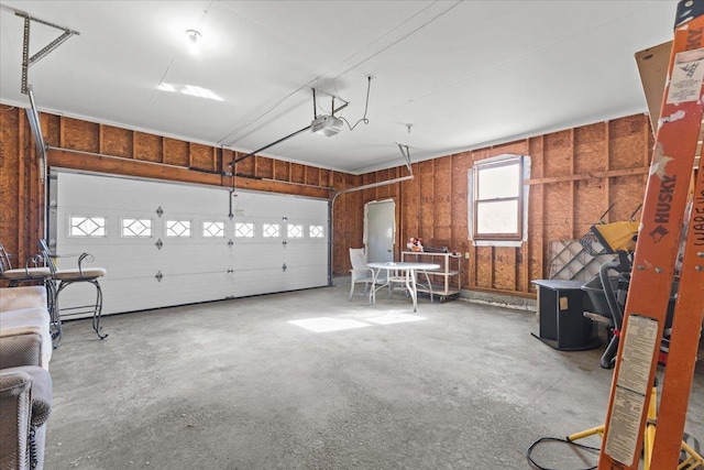 1 Pine Grove Ter, Winooski, VT 05404 - garage featuring a garage door opener