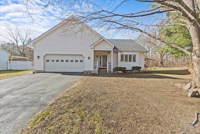 1 Pine Grove Ter, Winooski, VT 05404 - ranch-style home featuring a garage, driveway, and fence
