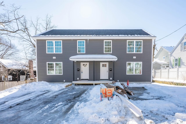 43 Laton St Unit A, Nashua, NH 03064 - colonial-style house featuring a porch and fence
