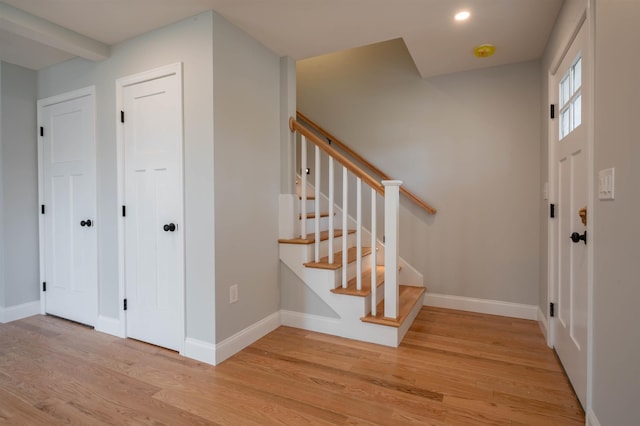 43 Laton St Unit A, Nashua, NH 03064 - foyer with recessed lighting, stairs, light wood-style floors, and baseboards