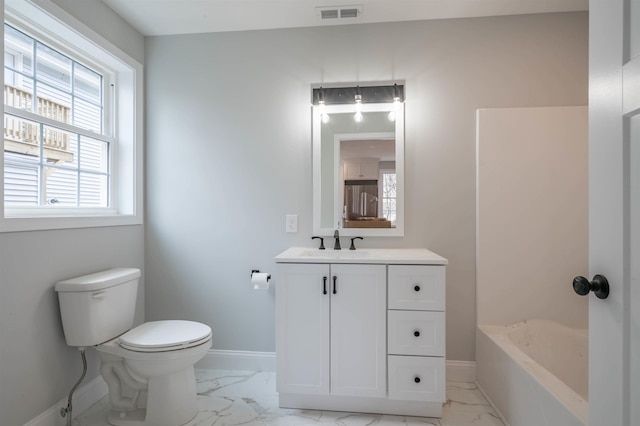 43 Laton St Unit A, Nashua, NH 03064 - full bathroom with visible vents, marble finish floor, baseboards, and toilet