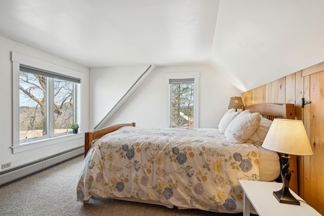 bedroom featuring a baseboard radiator, carpet, and lofted ceiling