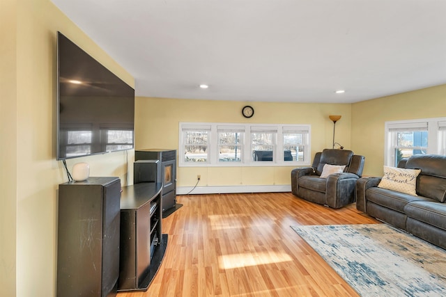 12 Wildwood Rd, Gilford, NH 03249 - living area featuring recessed lighting, light wood-style floors, and a baseboard radiator