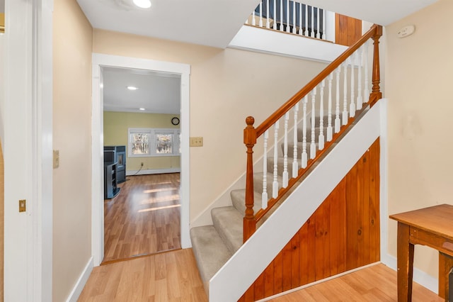 12 Wildwood Rd, Gilford, NH 03249 - staircase featuring baseboards, recessed lighting, and wood finished floors